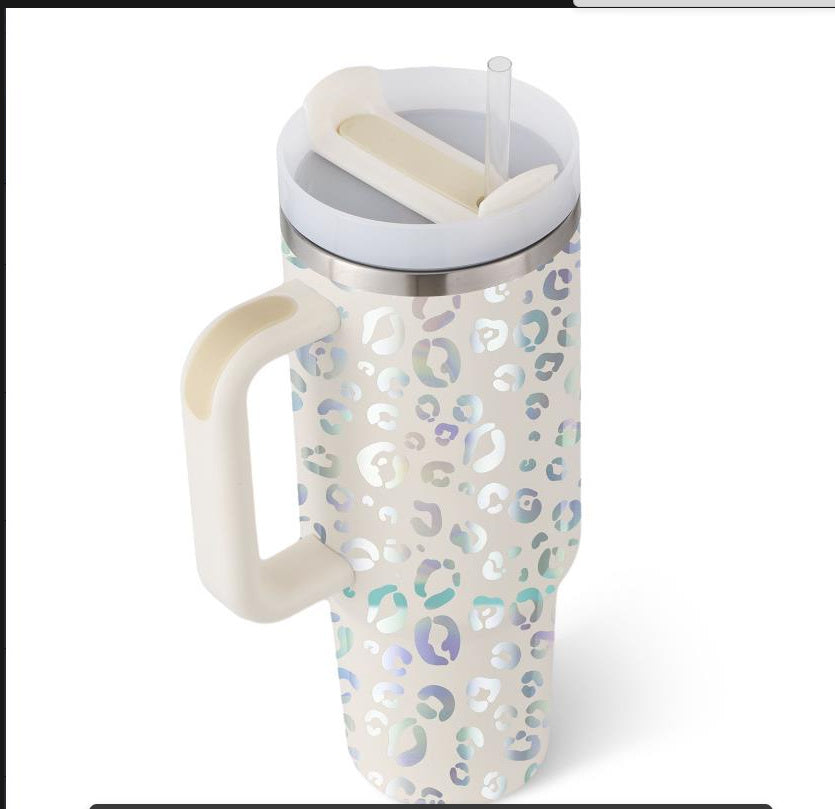 Tumbler with leopard print design on a white background
