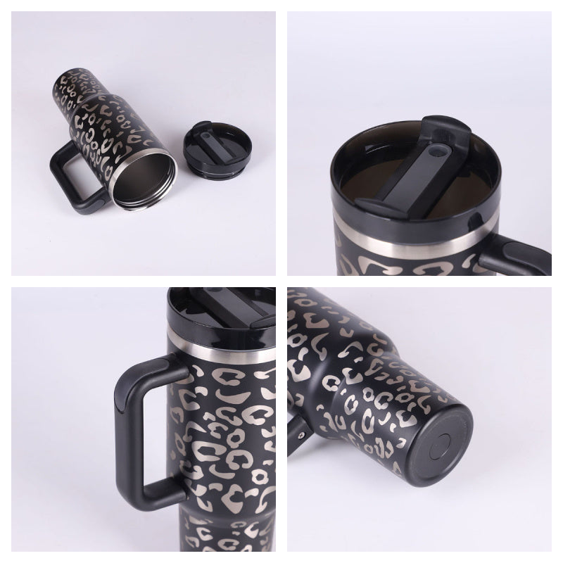 Leopard print travel mug with handle and lid on a white background